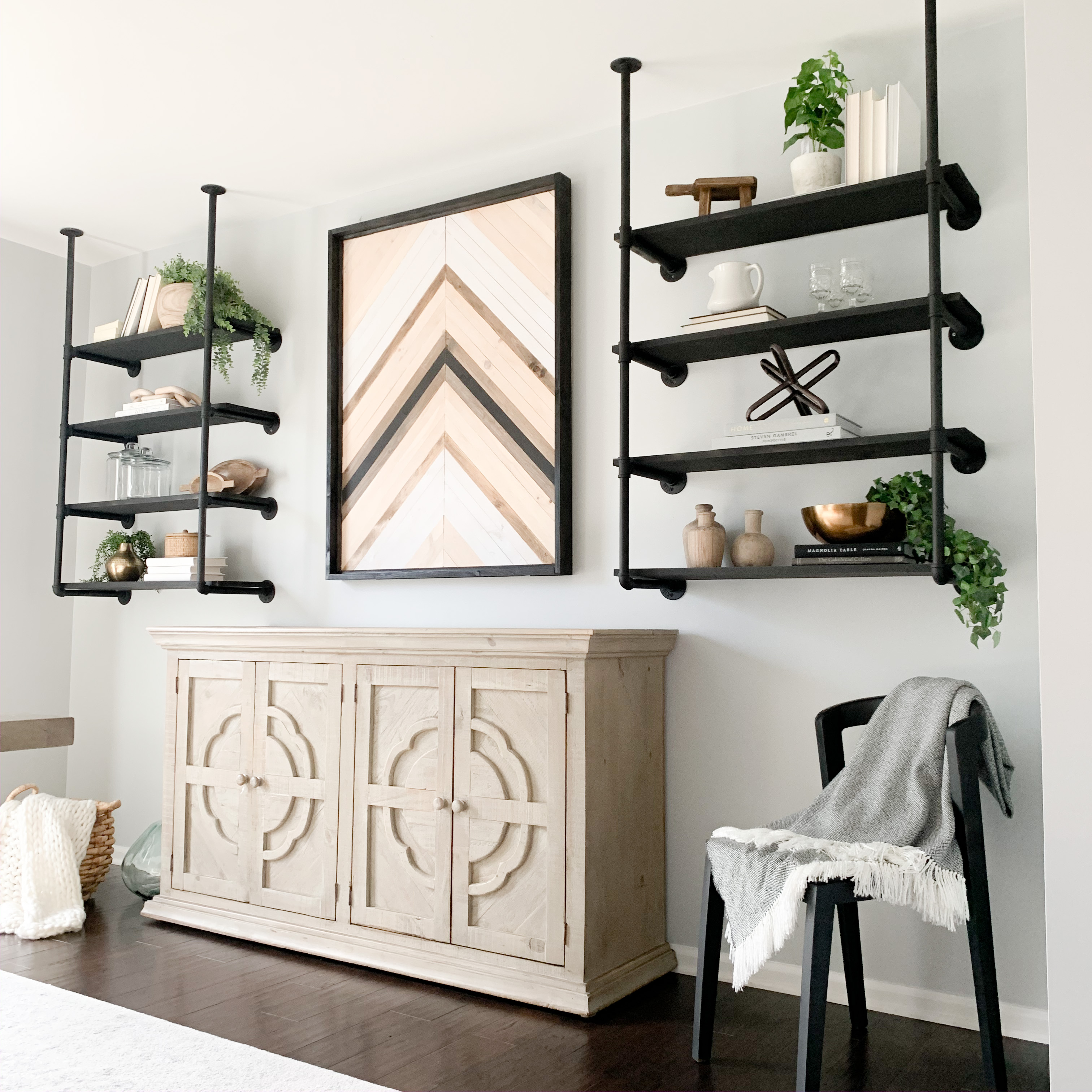 Decorated dining room shelves.