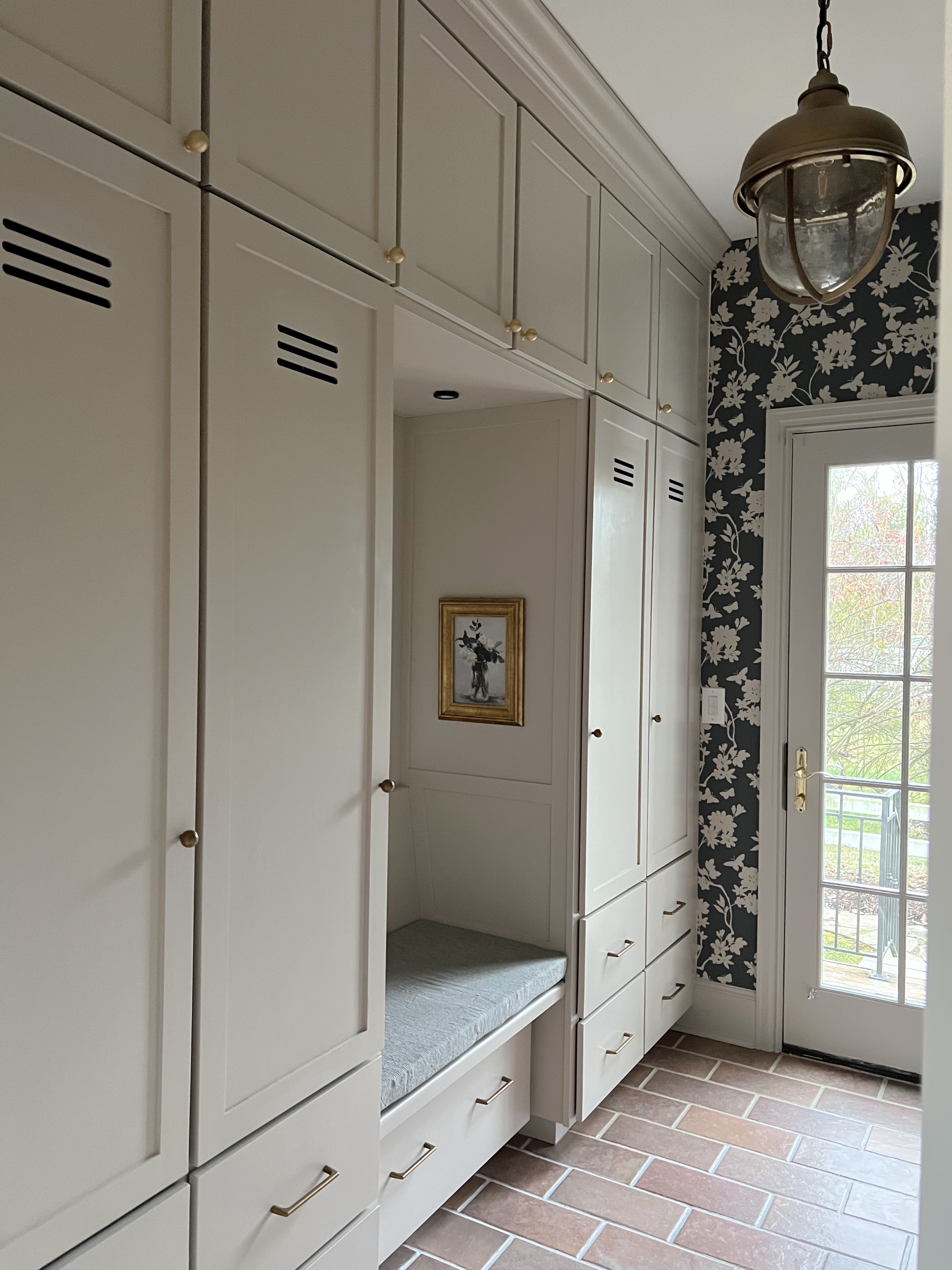 How to Paint Cabinets: mudroom cabinets painted in smokey beige.