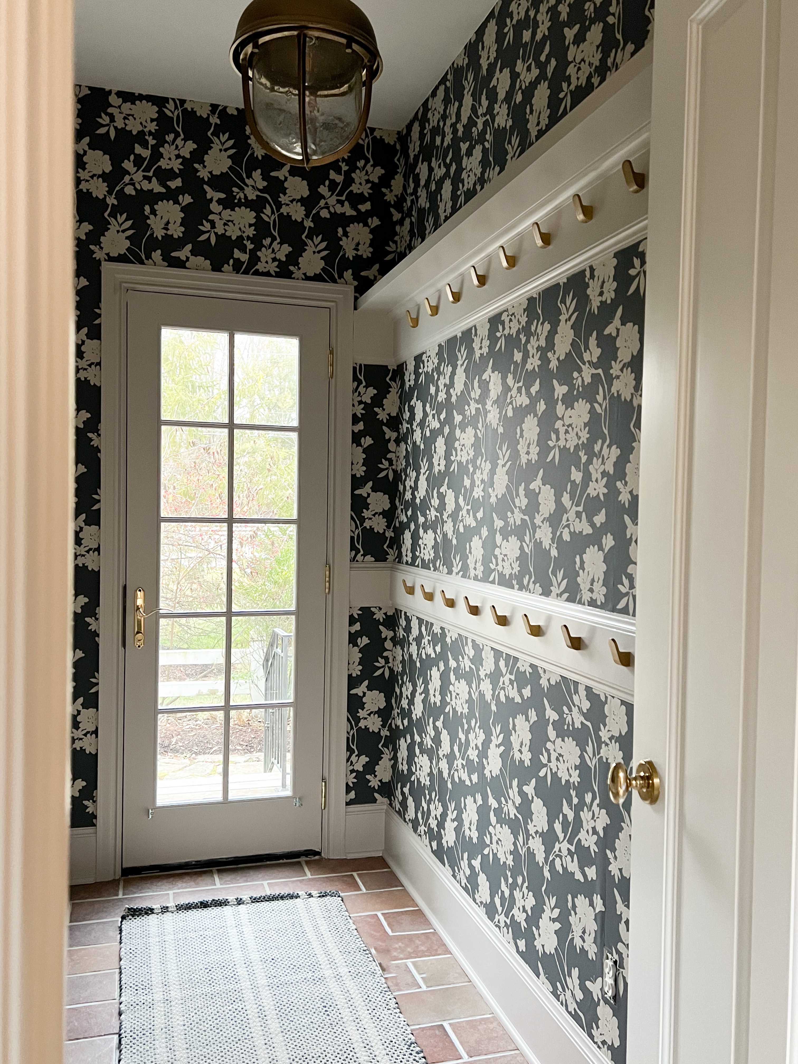 Completed Mudroom Makeover with fresh paint and wallpaper install.