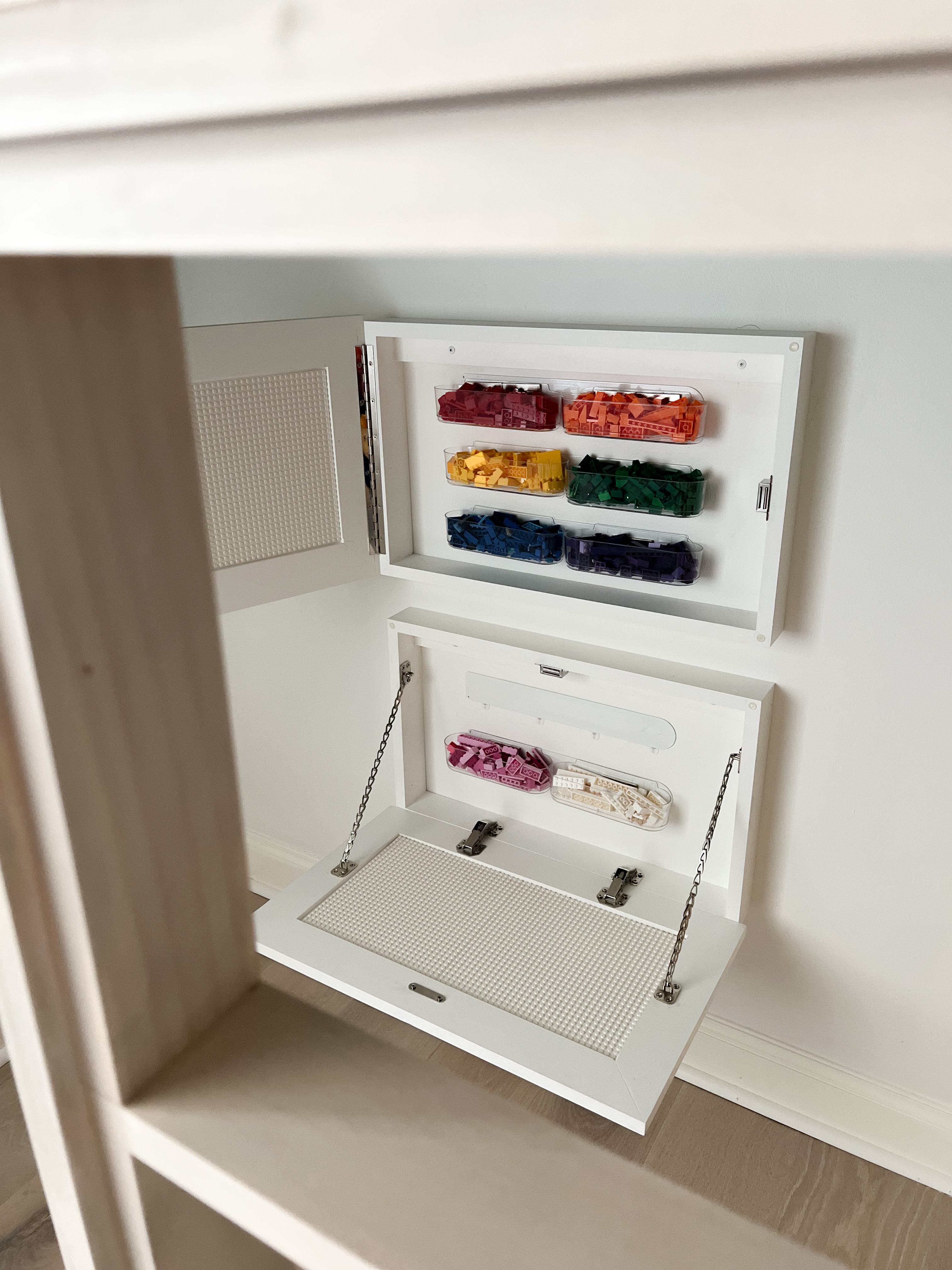 Image showing Hidden lego cabinets open, with legos inside.