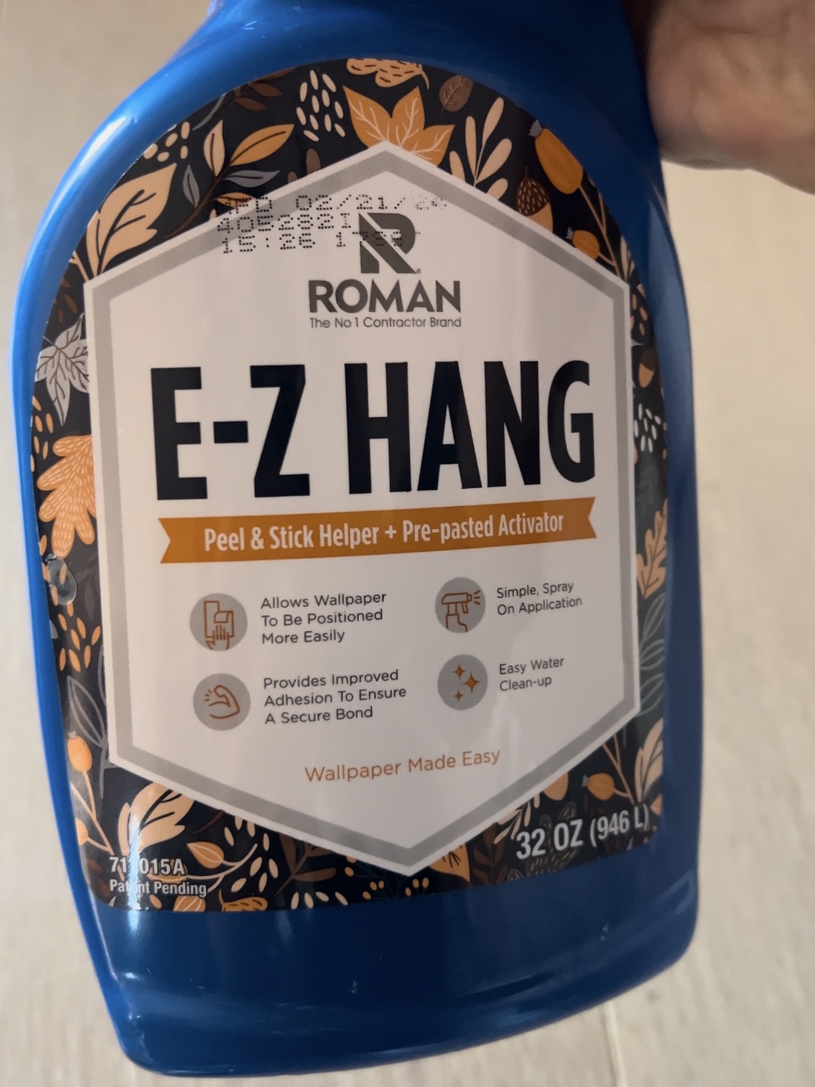 Tools for wallpaper installation: E-Z Hang bottle 