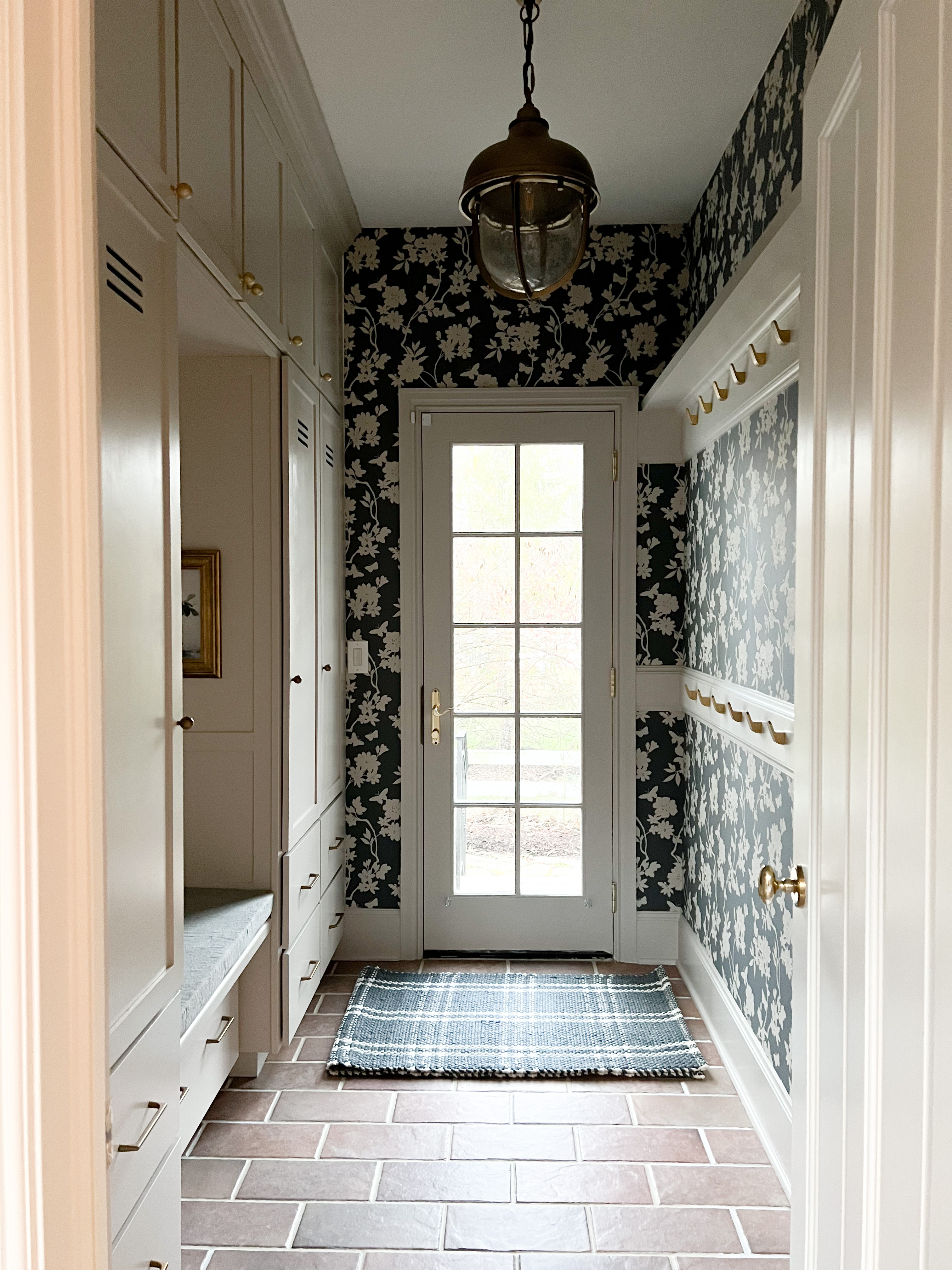 Mudroom Makeover after wallpaper installation.